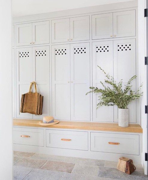 white cabinet with bench mudroom