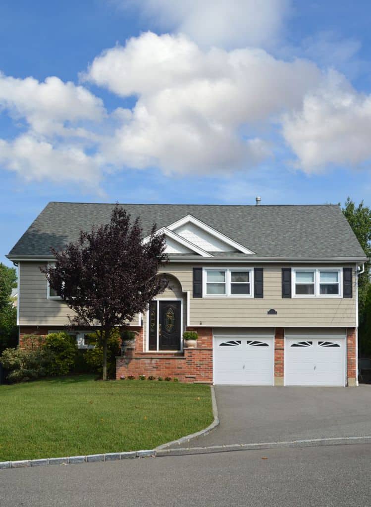 multi-level home with two door gargage