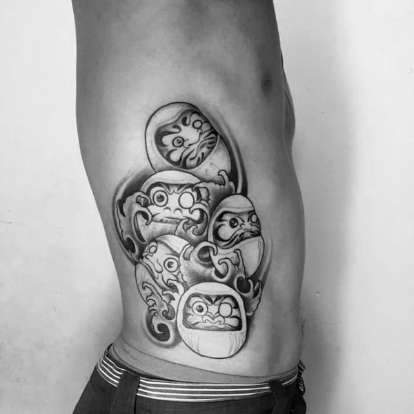 Multiple Daruma Dolls Mens Rib Cage Side Of Body Tattoo