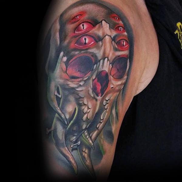 Multiple Eyed Cthulhu Mens Arm Tattoo With Wateroclor Deisgn