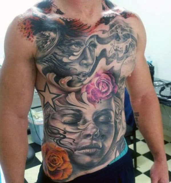 Man with detailed chest tattoos featuring faces and flowers