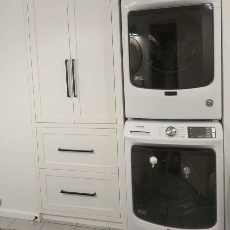 narrow white laundry washer and dryer
