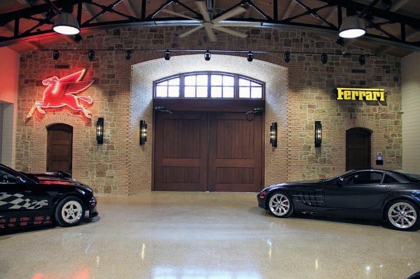 large barn garage with stone wall and polished concrete floor 