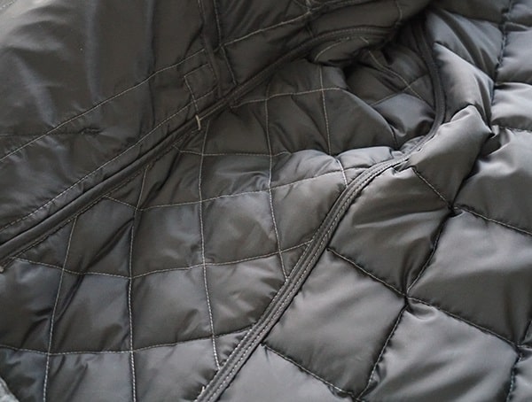 Nau Utility Wool Down Jacket Interior Bound Seams