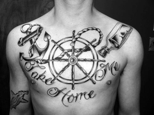 Chest tattoos of an anchor, ship wheel, message in a bottle, and "Take Me Home" text