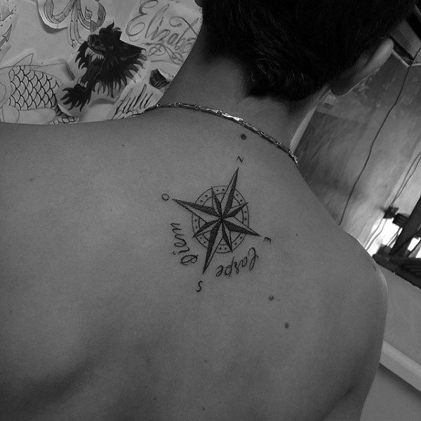 Nautical Star On Mans Back With Carpe Diem Words