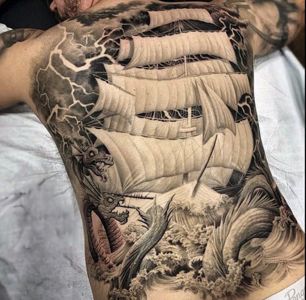 Nautical Themed White Sailed Ship And Fighting Dragons Tattoo Male Full Back