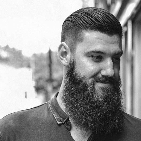 Neat Well Groomed Mens Undercut Slicked Back Hair With Beard