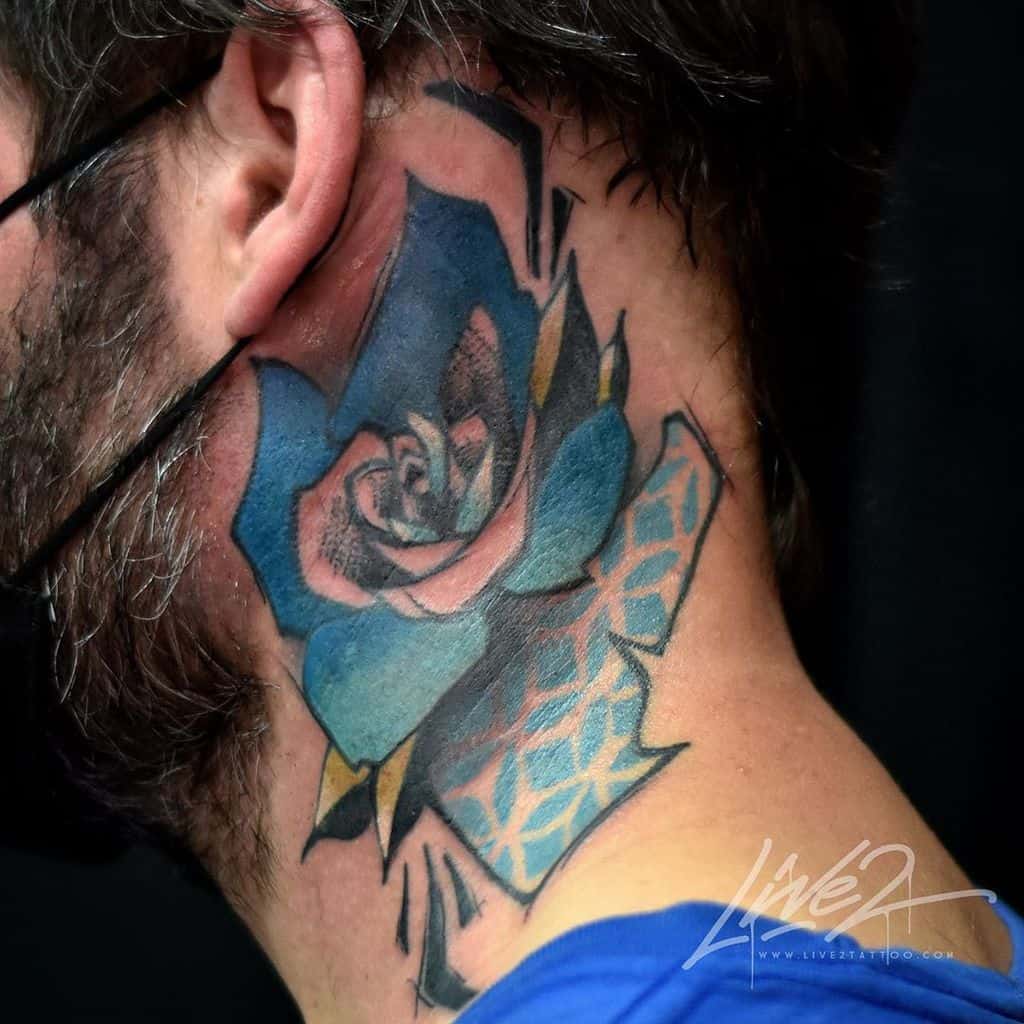 A colorful blue rose tattoo on the neck, with geometric shapes and vibrant shading, creating a bold and dynamic look