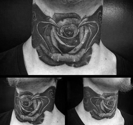 Black and gray neck tattoo of a rose on a man's throat 