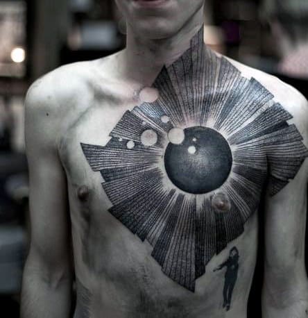 Large, abstract, black tattoo covering chest and extending to neck