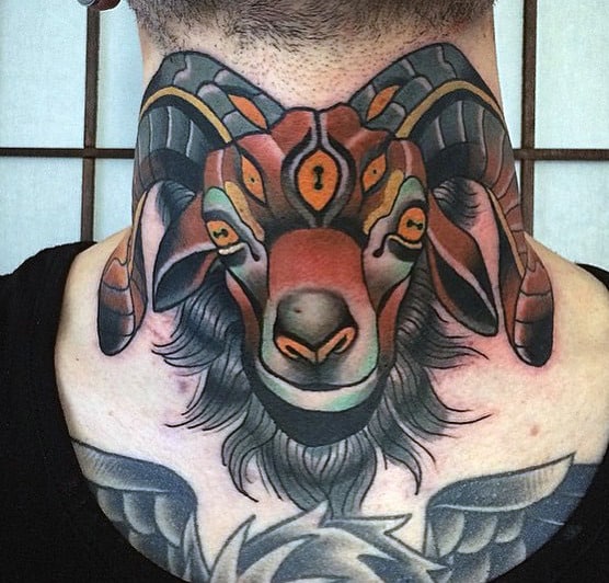 Neck tattoo of a stylized, multi-eyed, colorful goat with intricate detailing