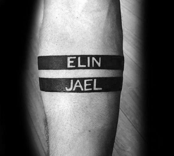 negative space black forearm band kids name tattoos for guys
