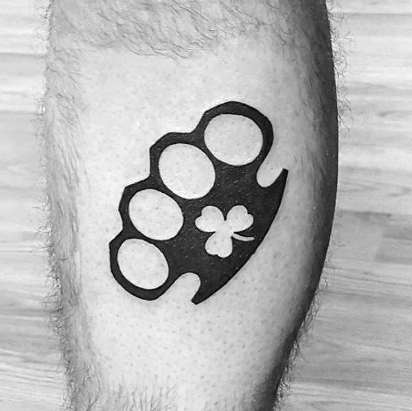 Negative Space Clover With Brass Knuckles Mens Black Ink Irish Leg Tattoos