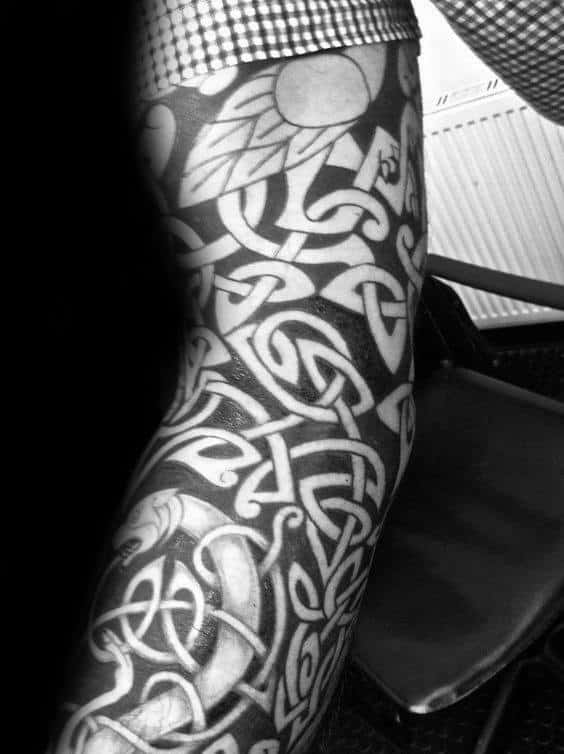 Negative Space Guys Black Ink Celtic Sleeve Tattoo