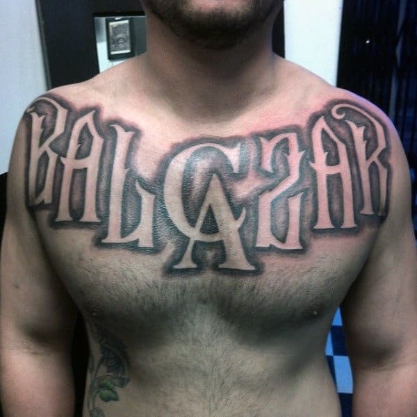 Negative Space Mens Last Name Upper Chest Tattoos