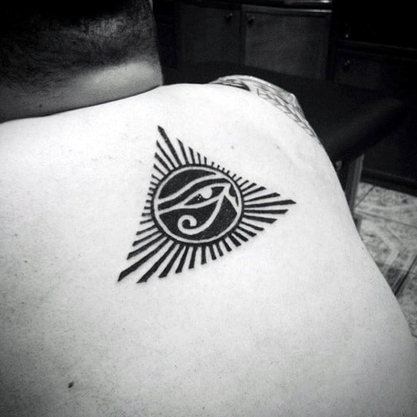 Negative Space Pyramid Eye Of Ra Tattoo On Man