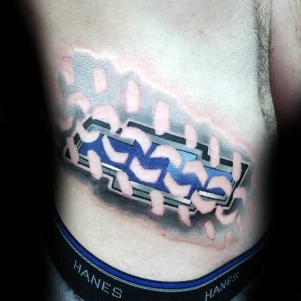 Negative Space Tire Tracks With Blue Chevy Logo Mens Rib Cage Side Tattoos