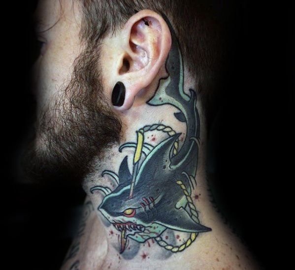 Neo-traditional neck tattoo of a fierce shark with rope detailing, yellow harpoon, and red star accents around the jaw.