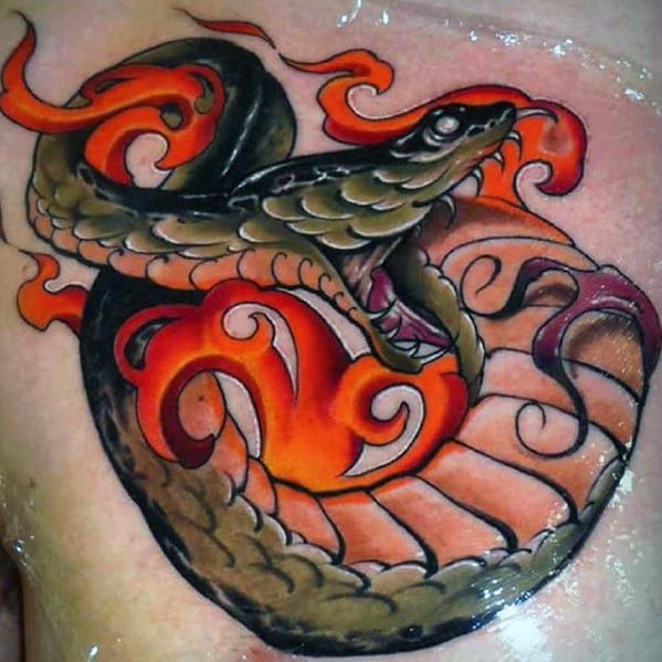 Neo-traditional tattoo of a coiled snake surrounded by vibrant orange flames, featuring bold shading and intricate details for a dynamic design.