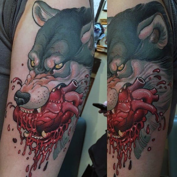 Neo-traditional tattoo of a fierce wolf biting into a bleeding heart, featuring bold shading, intense expression, and intricate details.