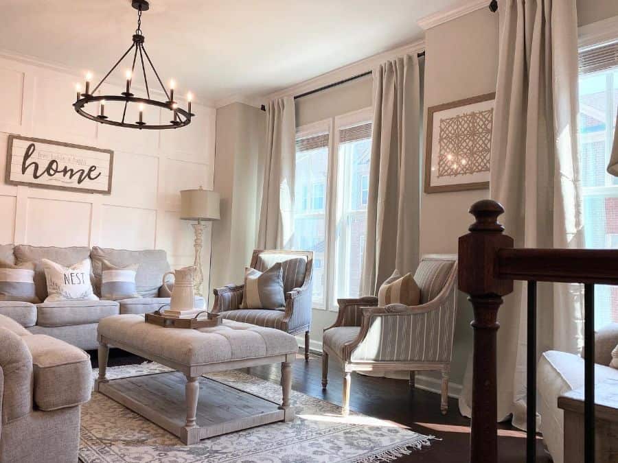 modern farmhouse living room gray furniture chandelier hardwood floor