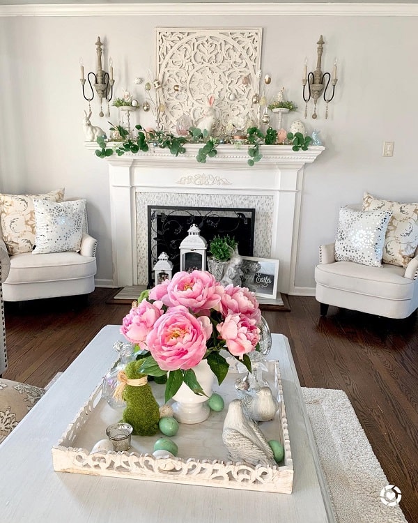 elegant country style living room with ornate fireplace
