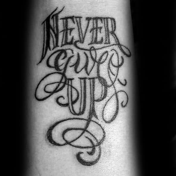 Never Give Up Orante Lettering Strength Tattoo Ideas For Guys On Forearm