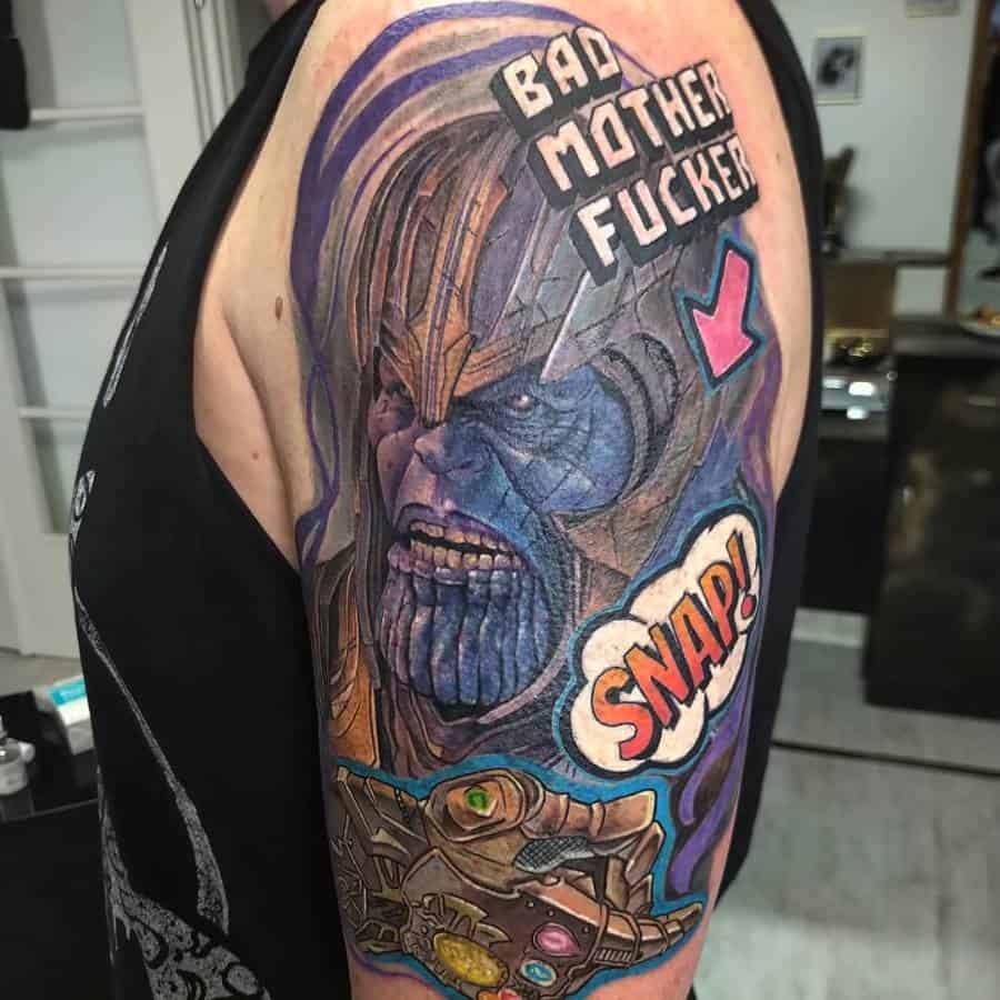 Bold Thanos tattoo with intense shading, the Infinity Gauntlet, and comic-style text featuring 'SNAP!' and a fierce expression