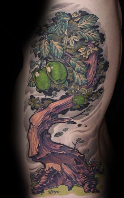 Vibrant tattoo of a twisting tree with rich green leaves, detailed bark, and large glossy apples, blending realism with a fantasy-inspired style.