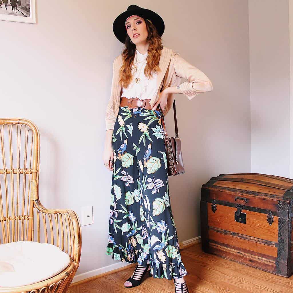 beige jacket under white top printed boho pants cool hats