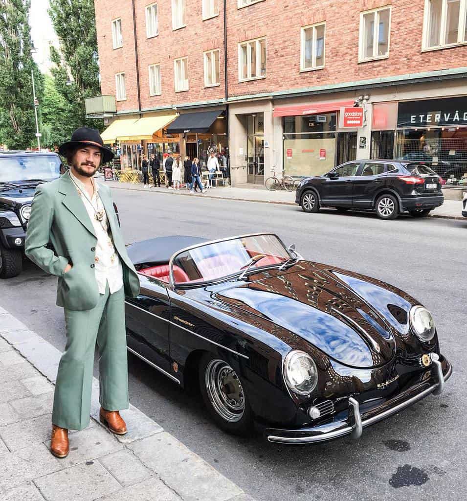 formal outfit blue gray coat and pants with cool hat and brown boots