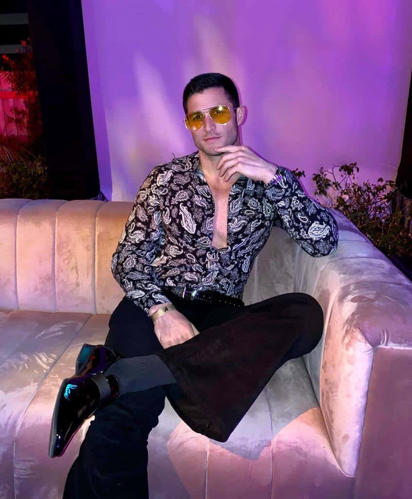 cool black printed long sleeve and black pants with cool yellow shades