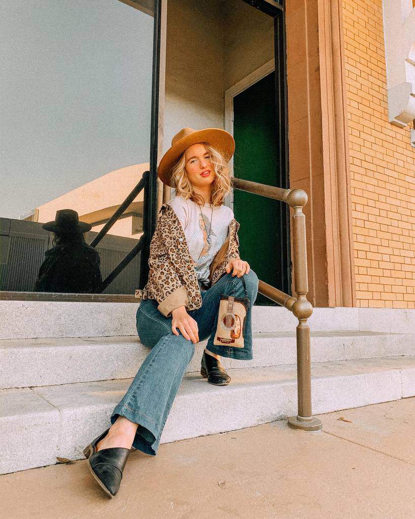 tiger print jacket under print shirt with cool hat