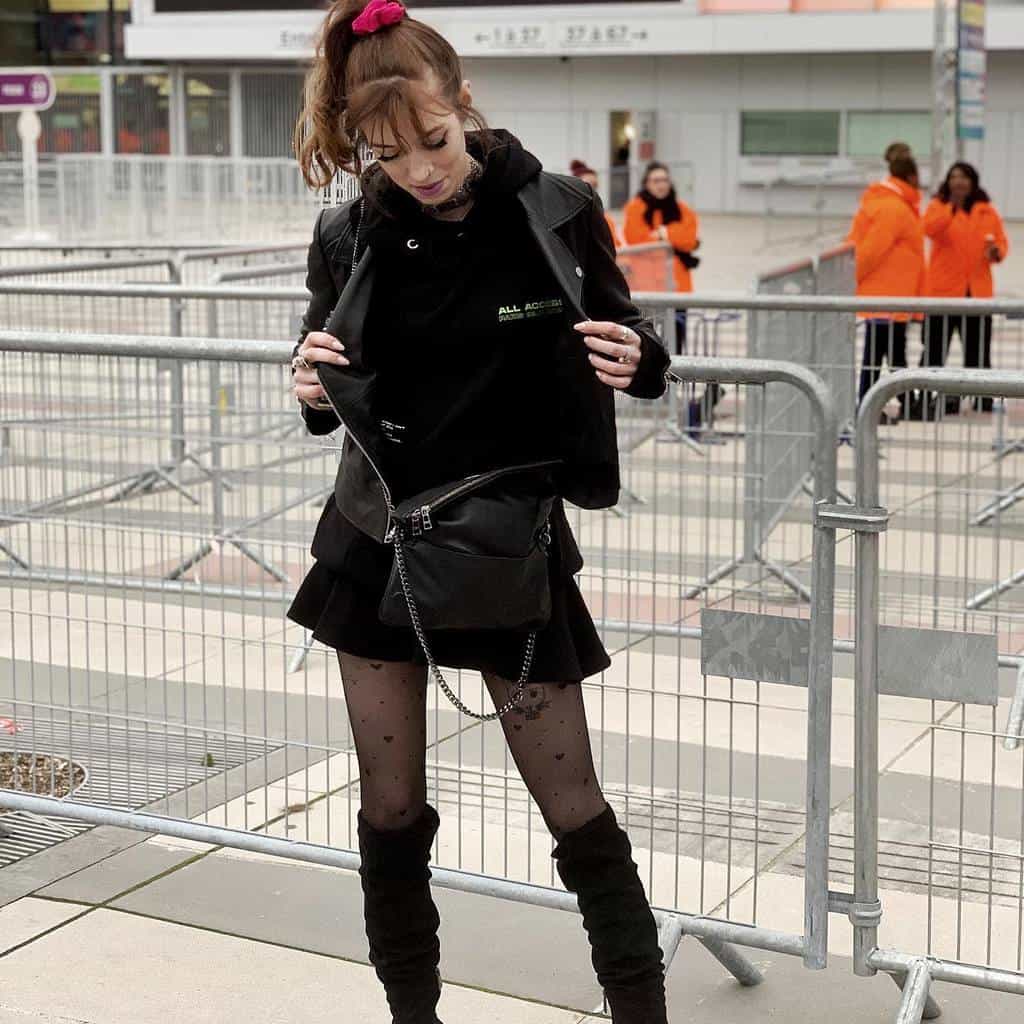 black jacket with black skirt 