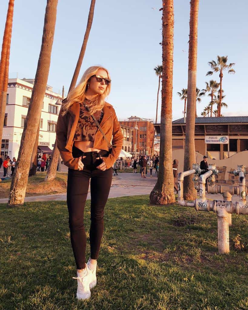 yellow jacket under with printed shirt in black pants