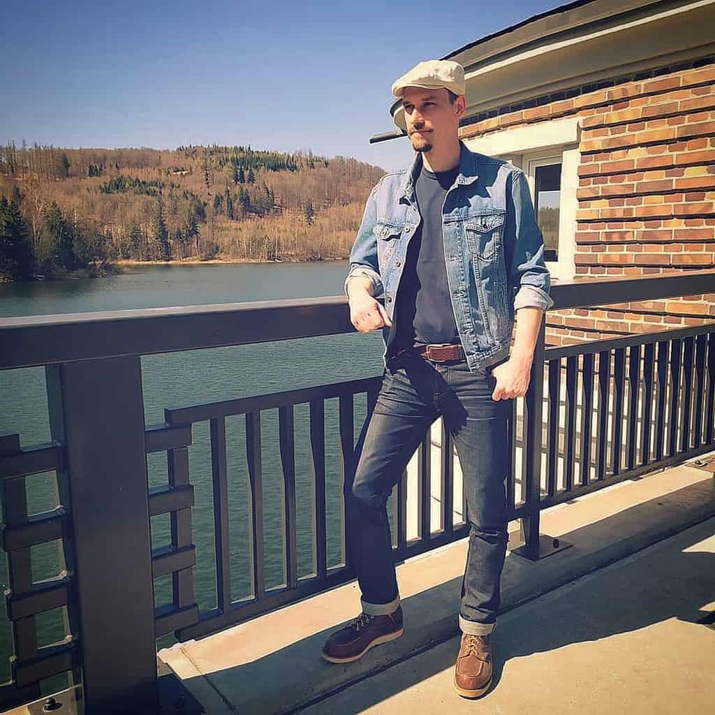 denim jacket under a shirt and denim pants also cool cap