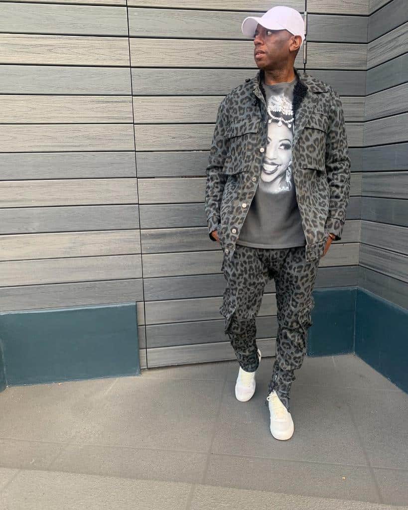 white hat combine with leopard inspired jacket and pants