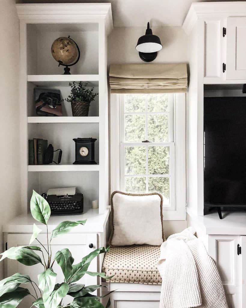 small reading nook between shelves typewriter