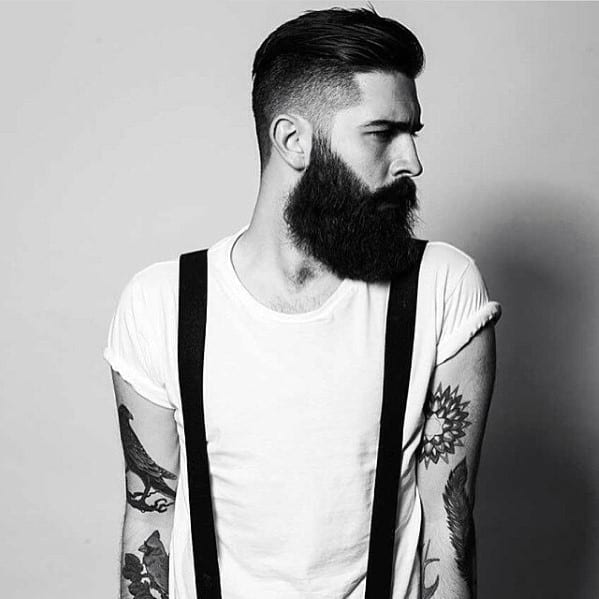 Undercut style with medium long black beard