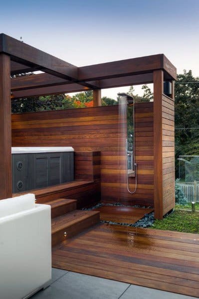 wood deck with shower and hot tub