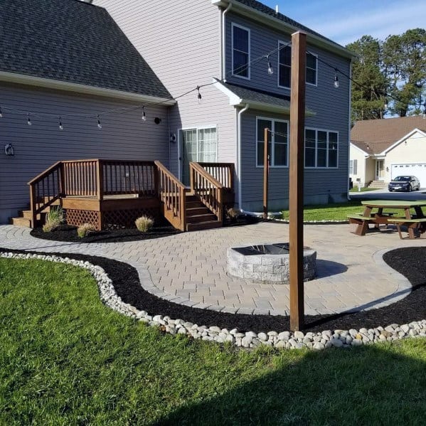 nice patio string light backyard ideas with stone fire pit