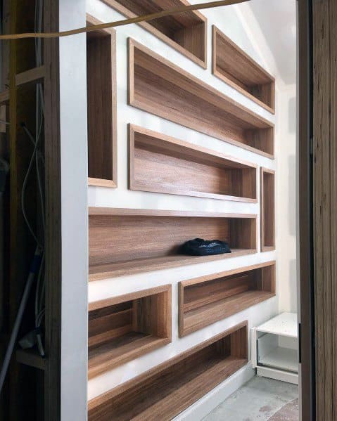 recessed wooden shelves