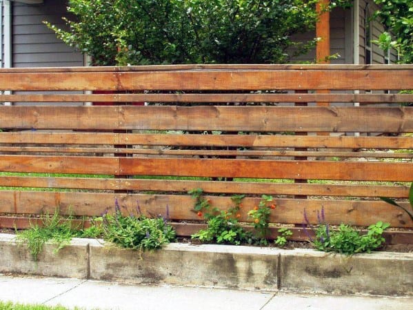 wooden fence with varied panel sizes