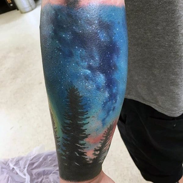 Night Sky With Stars And Pine Tree Forest Inner Forearm Male Tattoos