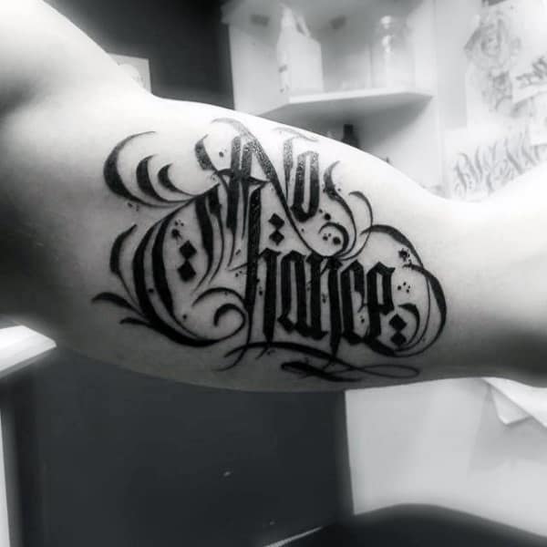 No Chance Old English Bicep Mens Tattoo Ideas