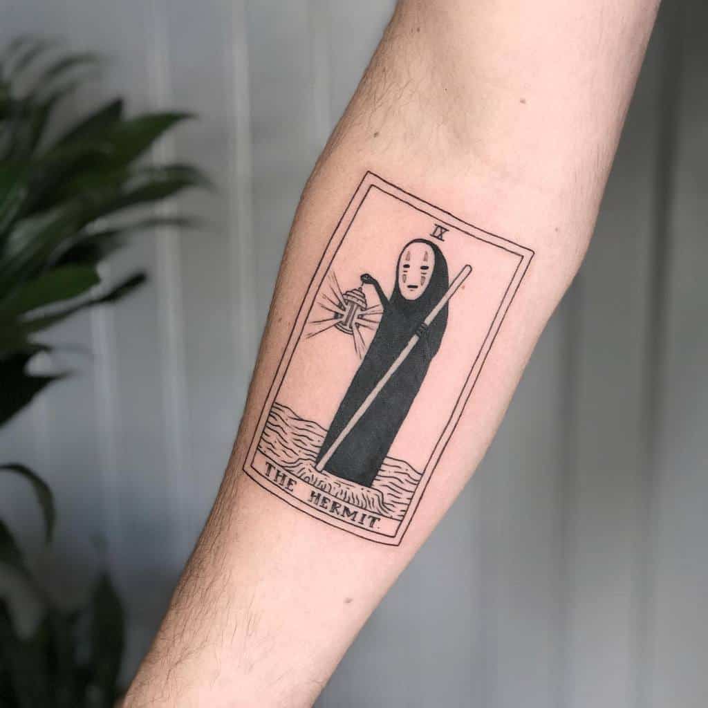 Minimalist black ink tattoo of No-Face from Spirited Away as 'The Hermit' tarot card, featuring fine lines and mystical symbolism