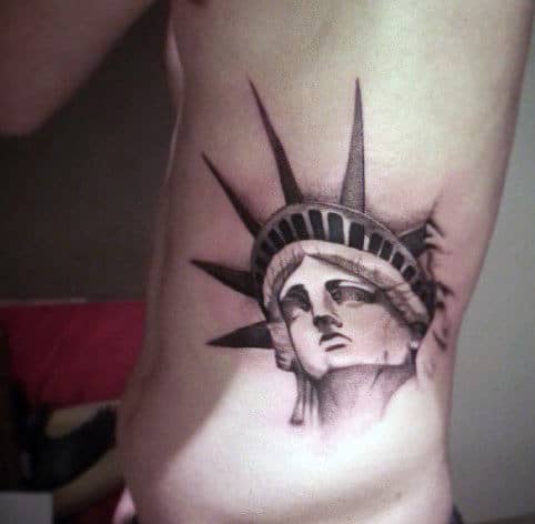 Nyc Statue Of Liberty Tattoo For Men On Rib Cage Side