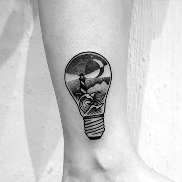 Ocean Waves With Lighthouse Light Bulb Male Tattoos On Lower Leg