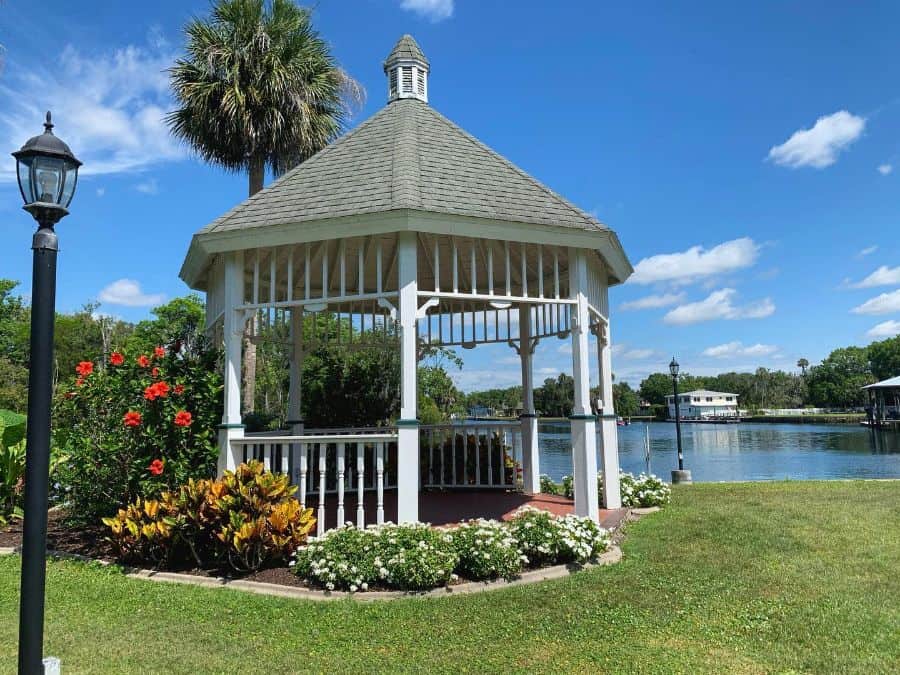 public white octagon gazebo tile roof river